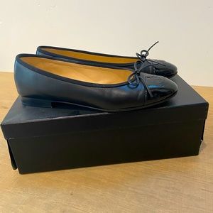 CHANEL black flats with original box and two dust bags.  Size 38.